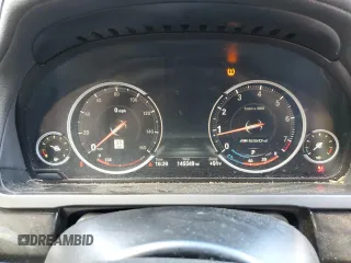 2015 BMW 7 Series 740Li with VIN WBAYE4C58FD138919, listed as a Copart auction lot 69409074 with 145,549 mi miles and Salvage Title. Bid and sale history available at DreamBid. Image 9.