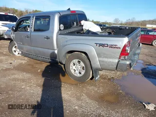 2014 Toyota Tacoma with VIN 3TMLU4EN5EM135783, listed as a IAAI auction lot 41520091 with 188,973 mi miles. Bid and sale history available at carsss.com. Image 3.