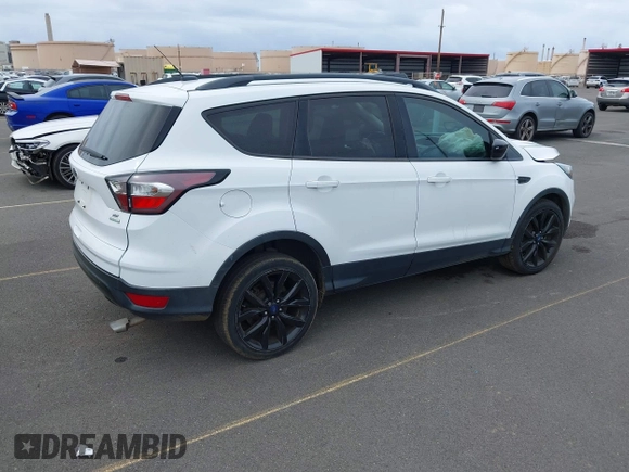 2018 Ford Escape SE with VIN 1FMCU0GD9JUA04709, listed as a IAAI auction lot 41831359 with 62,638 mi miles. Bid and sale history available at carsss.com. Image 4.