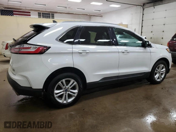 2020 Ford Edge SEL z VIN 2FMPK4J90LBB13748, wystawiony jako Copart lot #65687415 z przebiegiem 108 629 mil mil oraz Czysty tytuł • Clean title. Historia ofert i sprzedaży dostępna na DreamBid. Obrazek 3.