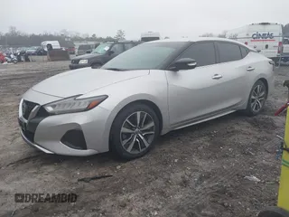 2019 Nissan Maxima Platinum z VIN 1N4AA6AV6KC372254, wystawiony jako IAAI lot #41519515 z przebiegiem 124 326 mil mil oraz . Historia ofert i sprzedaży dostępna na DreamBid. Obrazek 17.