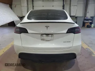 2022 Tesla Model Y Performance with VIN 7SAYGDEF7NF520825, listed as a Copart auction lot 57400245 with 55,437 mi miles and Salvage title. Bid and sale history available at DreamBid. Image 6.