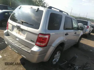 2011 Ford Escape XLT with VIN 1FMCU9DG2BKA63519, listed as a IAAI auction lot 36458159 with 168,475 mi miles. Bid and sale history available at carsss.com. Image 4.