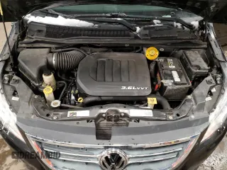 2014 Volkswagen Routan SE with VIN 2C4RVABG5ER135352, listed as a Copart auction lot 51677515 with 136,833 mi miles and Clean title. Bid and sale history available at DreamBid. Image 12.