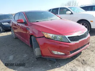 2012 Kia Optima SX z VIN 5XXGR4A60CG049992, wystawiony jako IAAI lot #41760937 z przebiegiem 153 769 mil mil oraz . Historia ofert i sprzedaży dostępna na DreamBid. Obrazek 1.
