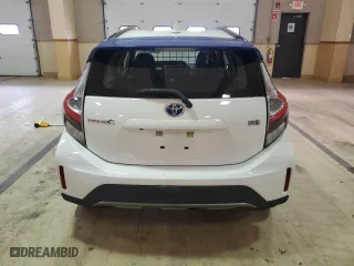 2018 Toyota Prius c One with VIN JTDKDTB39J1615373, listed as a Copart auction lot 52892405 with 84,514 mi miles and Clean Title. Bid and sale history available at carsss.com. Image 6.