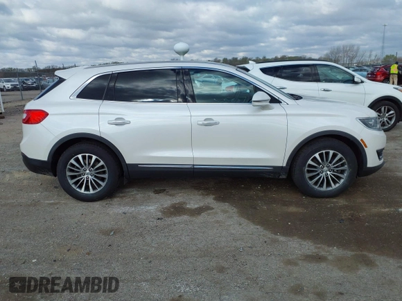 2016 Lincoln MKX Select with VIN 2LMTJ6KR3GBL61112, listed as a IAAI auction lot 42031424 with 130,321 mi miles. Bid and sale history available at carsss.com. Image 13.