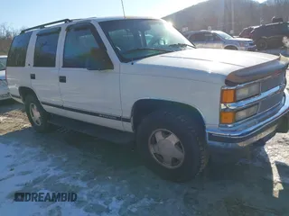 1999 Chevrolet Tahoe Z71 z VIN 1GNEK13R5XJ433714, wystawiony jako IAAI lot #41283782 z przebiegiem 64 014 mil mil oraz . Historia ofert i sprzedaży dostępna na DreamBid. Obrazek 1.