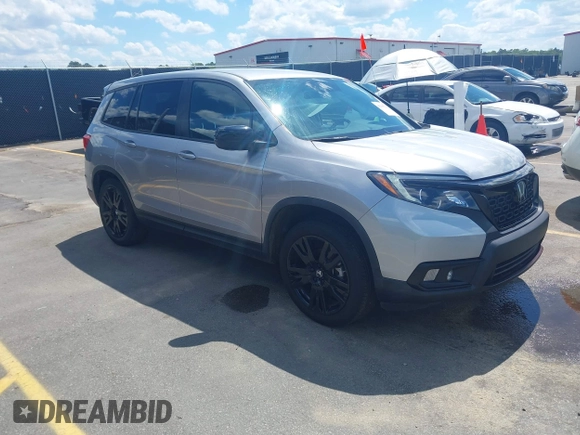 2021 Honda Passport Sport with VIN 5FNYF7H27MB003467, listed as a IAAI auction lot 42183219 with 52,156 mi miles and . Bid and sale history available at DreamBid. Image 1.