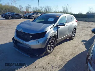 2018 Honda CR-V EX with VIN 7FARW2H56JE097214, listed as a IAAI auction lot 42061999 with 74,862 mi miles and . Bid and sale history available at DreamBid. Image 2.