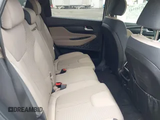 2019 Hyundai Santa Fe SE z VIN 5NMS2CADXKH005960, wystawiony jako IAAI lot #42341142 z przebiegiem 71 617 mil mil oraz . Historia ofert i sprzedaży dostępna na DreamBid. Obrazek 8.