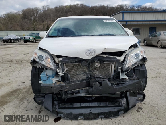 2016 Toyota Sienna LE with VIN 5TDJK3DC3GS131175, listed as a Copart auction lot 52520595 with 107,001 mi miles and Salvage Title. Bid and sale history available at carsss.com. Image 5.