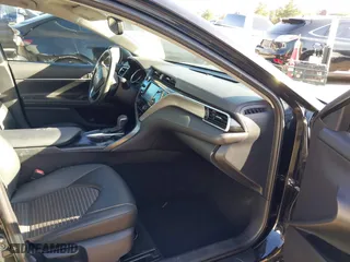 2018 Toyota Camry LE with VIN 4T1B11HK0JU667187, listed as a IAAI auction lot 41816582 with 119,692 mi miles. Bid and sale history available at carsss.com. Image 5.