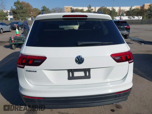 2020 Volkswagen Tiguan S z VIN 3VV1B7AX4LM098567, wystawiony jako IAAI lot #41504191 z przebiegiem 106 012 mil mil oraz . Historia ofert i sprzedaży dostępna na DreamBid. Obrazek 17.