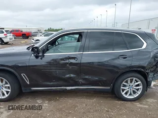 2021 BMW X5 xDrive45e with VIN 5UXTA6C02M9F88978, listed as a IAAI auction lot 42201563 with 23,339 mi miles and . Bid and sale history available at DreamBid. Image 15.