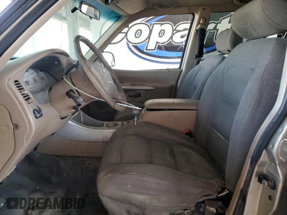 2001 Ford Explorer Sport Trac with VIN 1FMZU77E61UB89698, listed as a Copart auction lot 63945285 with 219,524 mi miles and Clean title. Bid and sale history available at DreamBid. Image 7.