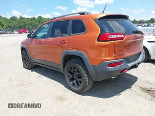 2016 Jeep Cherokee Trailhawk with VIN 1C4PJMBS6GW318035, listed as a IAAI auction lot 42652034 with 187,519 mi miles and . Bid and sale history available at DreamBid. Image 3.