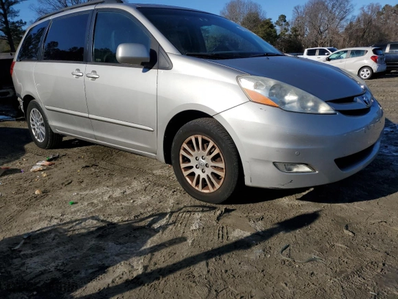 2010 Toyota Sienna XLE with VIN 5TDYK4CC7AS308971, listed as a Copart auction lot 45573395 with 156,318 mi miles and Salvage Title. Bid and sale history available at carsss.com. Image 4.