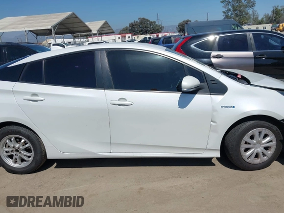2021 Toyota Prius L Eco with VIN JTDKAMFU8M3135142, listed as a IAAI auction lot 42317007 with 77,353 mi miles and . Bid and sale history available at DreamBid. Image 13.
