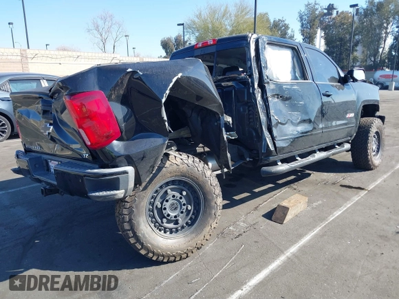 2018 Chevrolet Silverado 1500 LTZ with VIN 3GCUKSEC1JG560567, listed as a IAAI auction lot 41664625 with Not Provided miles and . Bid and sale history available at DreamBid. Image 4.