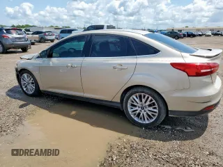 2018 Ford Focus Titanium z VIN 1FADP3J26JL279443, wystawiony jako Copart lot #58837435 z przebiegiem 136 538 mil mil oraz Szkoda całkowita • Salvage title. Historia ofert i sprzedaży dostępna na DreamBid. Obrazek 2.