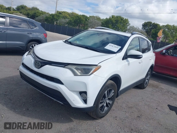 2018 Toyota RAV4 XLE with VIN JTMWFREV7JJ731893, listed as a IAAI auction lot 41567850 with 141,269 mi miles. Bid and sale history available at carsss.com. Image 17.
