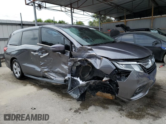 2019 Honda Odyssey EX-L with VIN 5FNRL6H75KB004911, listed as a Copart auction lot 48954335 with 74,720 mi miles and Clean Title. Bid and sale history available at carsss.com. Image 4.