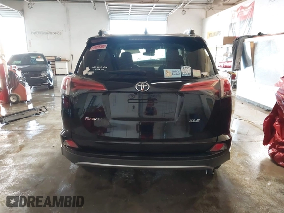 2018 Toyota RAV4 XLE with VIN 2T3WFREV1JW471931, listed as a IAAI auction lot 41332851 with 123,657 mi miles. Bid and sale history available at carsss.com. Image 17.