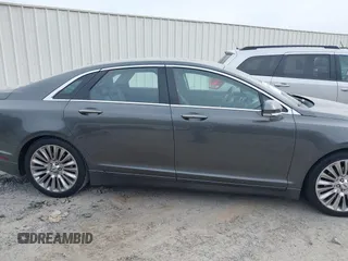2015 Lincoln MKZ with VIN 3LN6L2J9XFR623933, listed as a IAAI auction lot 41799821 with 85,388 mi miles and . Bid and sale history available at DreamBid. Image 13.