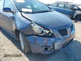 2009 Pontiac Vibe w/1SB with VIN 5Y2SL67059Z423173, listed as a IAAI auction lot 41779483 with 108,896 mi miles. Bid and sale history available at carsss.com. Image 6.