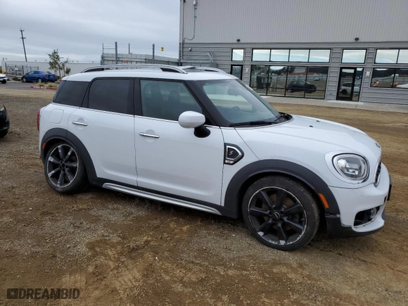 2020 MINI Countryman Cooper S with VIN WMZYW7C00L3L48776, listed as a Copart auction lot 80785704 with 84,194 mi miles and Salvage Title. Bid and sale history available at carsss.com. Image 4.