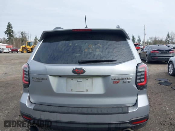 2015 Subaru Forester XT Touring with VIN JF2SJGWC1FH571301, listed as a IAAI auction lot 41682258 with 51,505 mi miles and . Bid and sale history available at DreamBid. Image 17.