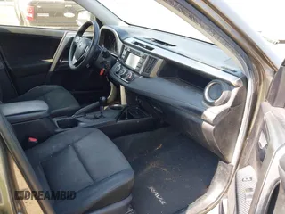 2014 Toyota RAV4 LE with VIN JTMZFREVXED034316, listed as a IAAI auction lot 42610135 with 214,871 mi miles and . Bid and sale history available at DreamBid. Image 5.