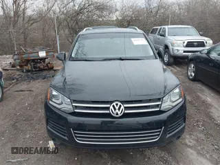 2012 Volkswagen Touareg Sport with VIN WVGFK9BP7CD002243, listed as a IAAI auction lot 41863765 with 136,231 mi miles and . Bid and sale history available at DreamBid. Image 12.