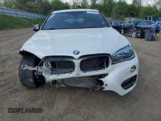 2017 BMW X6 sDrive35i z VIN 5UXKU0C52H0F99663, wystawiony jako Copart lot #57293445 z przebiegiem 71 491 mil mil oraz Szkody całkowita. Historia ofert i sprzedaży dostępna na DreamBid. Obrazek 5.