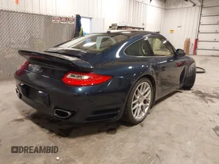2011 Porsche 911 Turbo with VIN WP0AD2A93BS766801, listed as a IAAI auction lot 41566167 with 66,785 mi miles. Bid and sale history available at carsss.com. Image 4.