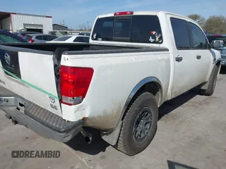 2004 Nissan Titan LE with VIN 1N6AA07A34N570788, listed as a IAAI auction lot 41823592 with 228,344 mi miles and . Bid and sale history available at DreamBid. Image 4.