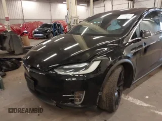 2016 Tesla Model X 70D with VIN 5YJXCBE23GF004941, listed as a IAAI auction lot 41706603 with 108,052 mi miles and . Bid and sale history available at DreamBid. Image 6.
