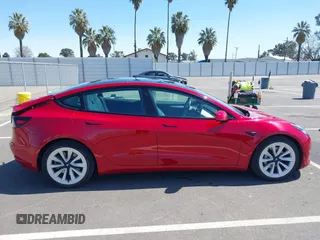 2021 Tesla Model 3 Long Range z VIN 5YJ3E1EB1MF997208, wystawiony jako IAAI lot #41944276 z przebiegiem 110 361 mil mil oraz . Historia ofert i sprzedaży dostępna na DreamBid. Obrazek 13.