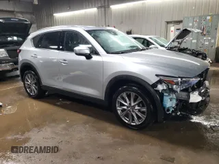 2020 Mazda CX-5 Grand Touring with VIN JM3KFBDM5L1762861, listed as a Copart auction lot 49272205 with 38,809 mi miles and Salvage Title. Bid and sale history available at carsss.com. Image 4.