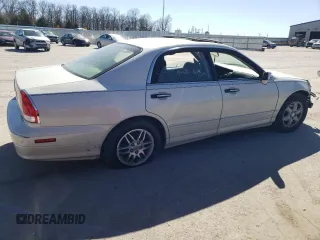 2003 Mitsubishi Diamante LS z VIN 6MMAP67P23T003075, wystawiony jako Copart lot #47373425 z przebiegiem 216 694 mil mil oraz Szkoda całkowita • Salvage title. Historia ofert i sprzedaży dostępna na DreamBid. Obrazek 3.