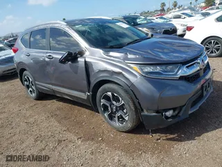 2019 Honda CR-V Touring with VIN 7FARW1H99KE005270, listed as a IAAI auction lot 41762812 with 122,583 mi miles. Bid and sale history available at carsss.com. Image 1.