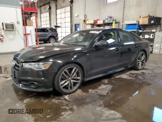 2016 Audi S6 Prestige z VIN WAUH2AFC4GN096343, wystawiony jako Copart lot #68166002 z przebiegiem 111 836 mil mil oraz . Historia ofert i sprzedaży dostępna na DreamBid. Obrazek 1.