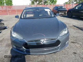 2014 Tesla Model S 60 with VIN 5YJSA1S11EFP35998, listed as a IAAI auction lot 42316563 with 83,835 mi miles and . Bid and sale history available at DreamBid. Image 13.