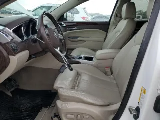 2012 Cadillac SRX Luxury Collection z VIN 3GYFNAE34CS648291, wystawiony jako Copart lot #55090415 z przebiegiem 103 286 mil mil oraz Szkoda całkowita • Salvage title. Historia ofert i sprzedaży dostępna na DreamBid. Obrazek 7.