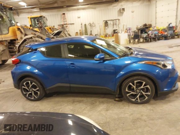 2019 Toyota C-HR XLE with VIN JTNKHMBX0K1042342, listed as a IAAI auction lot 41935879 with 54,190 mi miles and . Bid and sale history available at DreamBid. Image 13.