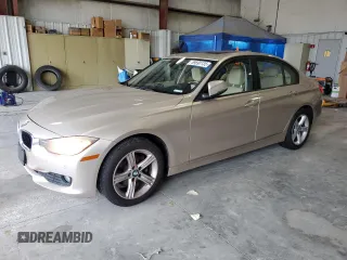 2014 BMW 3 Series 320i xDrive with VIN WBA3C3G53ENS68118, listed as a Copart auction lot 59690135 with 98,749 mi miles and Salvage title. Bid and sale history available at DreamBid. Image 1.