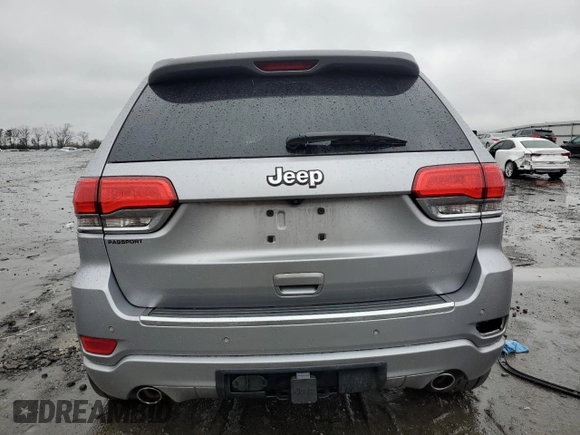 2014 Jeep Grand Cherokee Overland with VIN 1C4RJECG9EC341865, listed as a Copart auction lot 44354615 with 141,601 mi miles and Salvage Title. Bid and sale history available at carsss.com. Image 6.