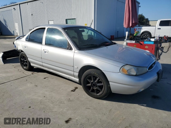 1998 Ford Contour z VIN 3FAFP66L8WM142974, wystawiony jako Copart lot #42175265 z przebiegiem 195 277 mil mil oraz Szkoda całkowita • Salvage title. Historia ofert i sprzedaży dostępna na DreamBid. Obrazek 4.