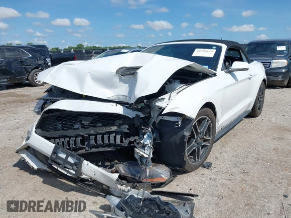 2018 Ford Mustang EcoBoost Premium z VIN 1FATP8UH3J5166286, wystawiony jako IAAI lot #42390424 z przebiegiem 92 077 mil mil oraz . Historia ofert i sprzedaży dostępna na DreamBid. Obrazek 17.